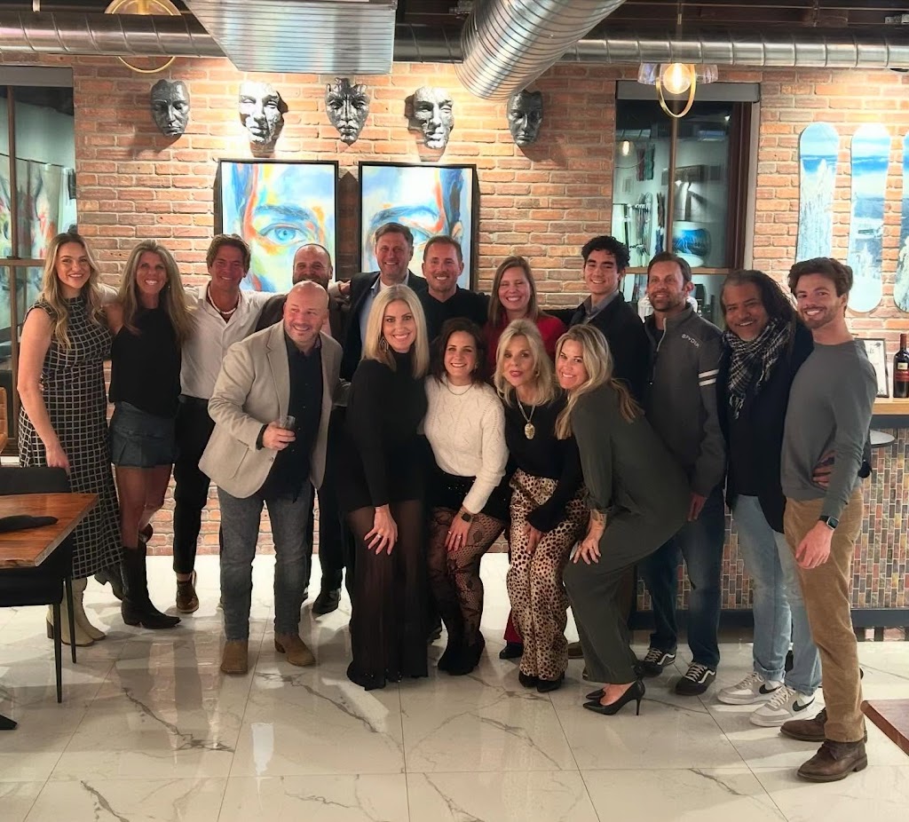 Justin Acker and The Acker Group team together at a team event